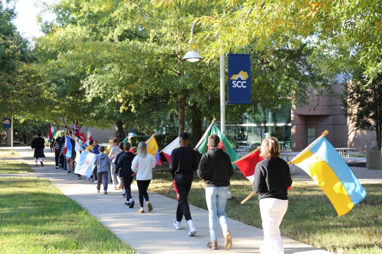 students with flags at the SCC International Festival