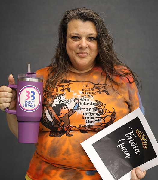 Amy Caldwell enjoying coffee and trivia.