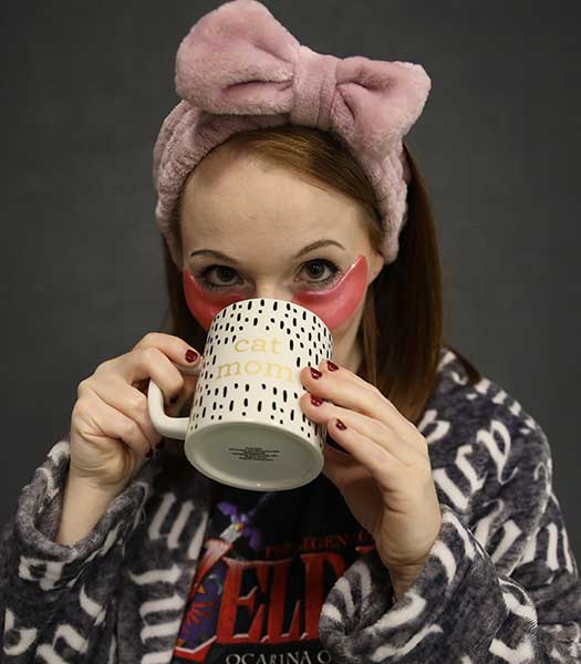 Natasha Payne relaxing with some coffee