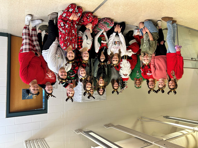 Santa with Clinton Cosmetology students and the chosen children