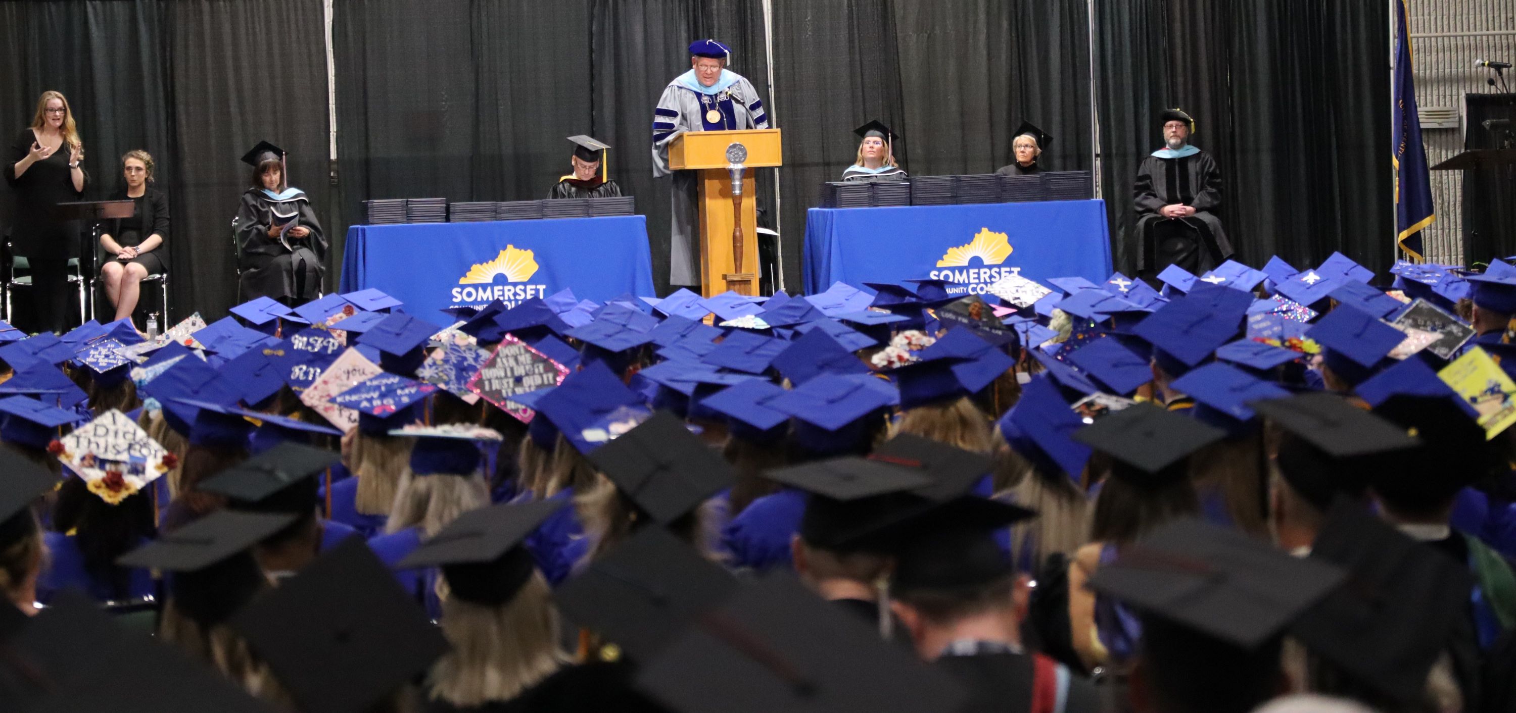 Dr. Carey Castle delivers a speech to graduates