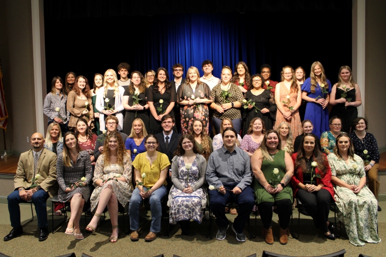 group of new PTK members (names listed in the caption)