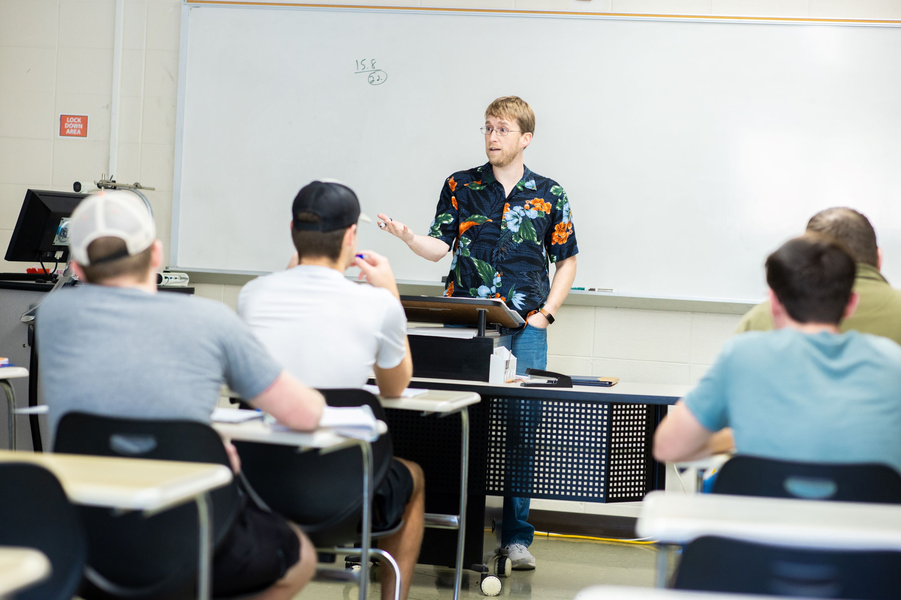 male teaching in classroom