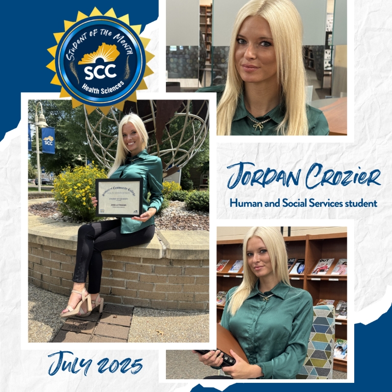 SCC Health Sciences Student of the Month for July 2025: Jordan Crozier (holding the award certificate and smiling in the library)