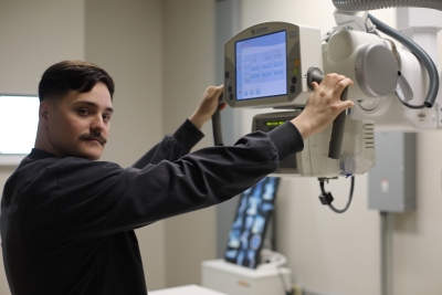 Jacob Davidson working with an x-ray machine