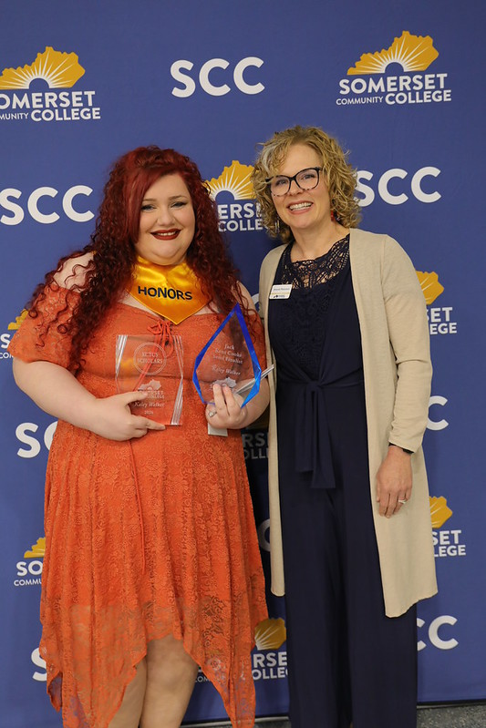 SCC student, Kaley Walker, posing with her awards with Professor Dr. Amanda Waterstrat