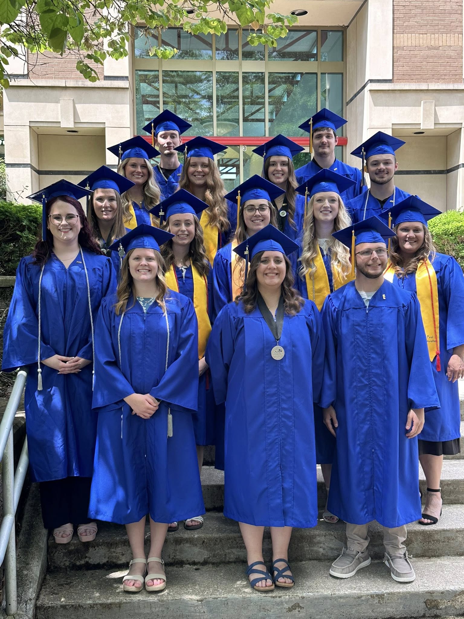 PTA Class of 2025 in graduation robes