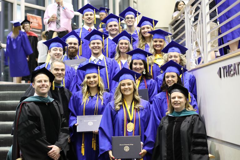 PTA Spring 2023 Graduates posing with their professors at Commencement Ceremony at the Center for Rural Development in Somerset, KY